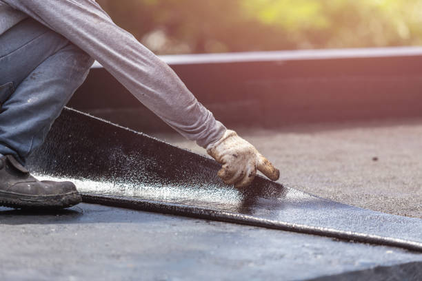 Professional Waterproofing technician working in Springfield, KY